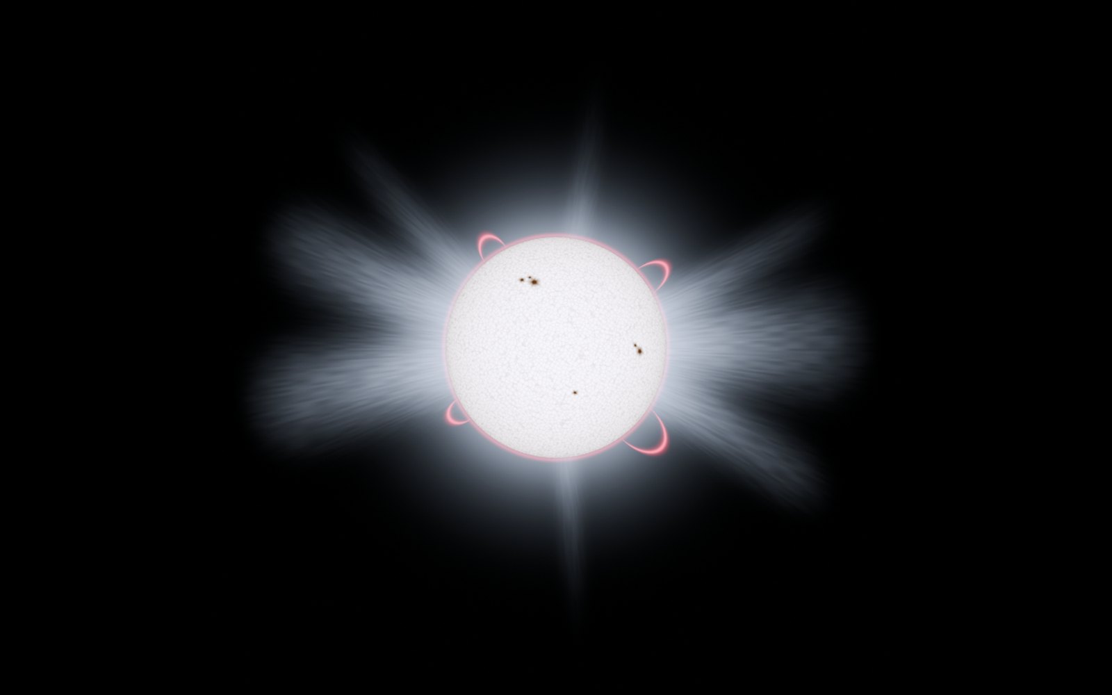 The Sun: granulation, sunspots and a streaming corona